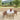 Round patio wooden table-comfortable armchairs malta